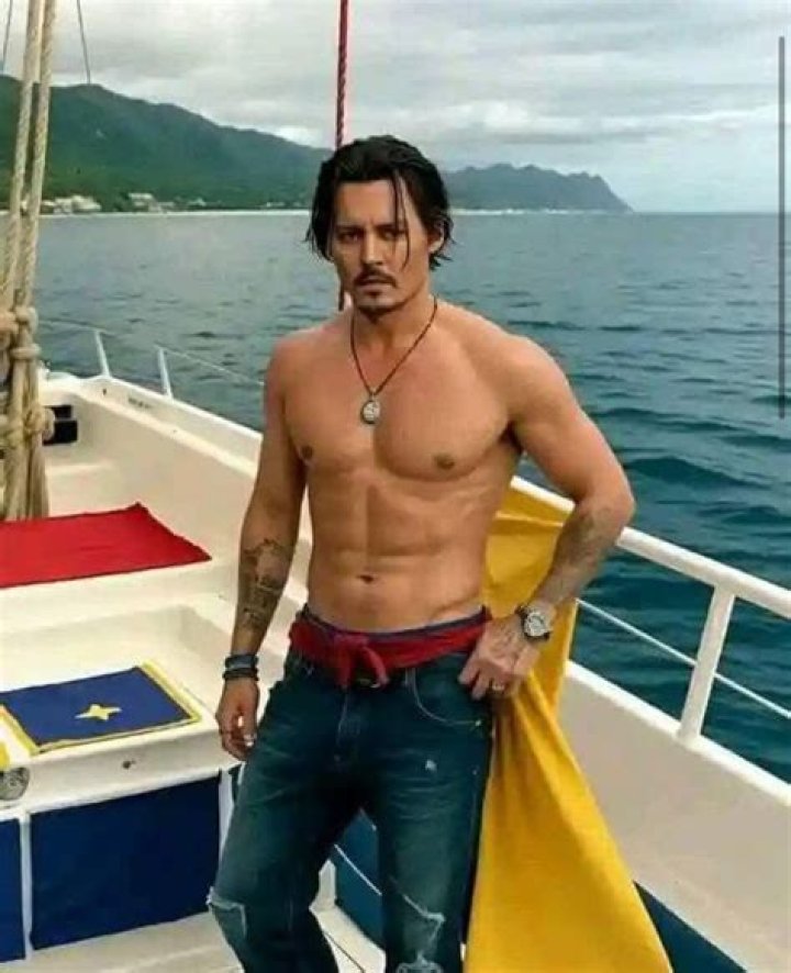 Johnny Depp walking shirtless