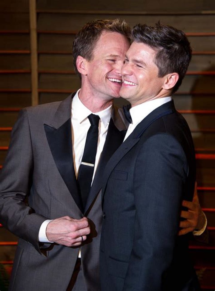 Neil Patrick Harris and David Burtka on a beach